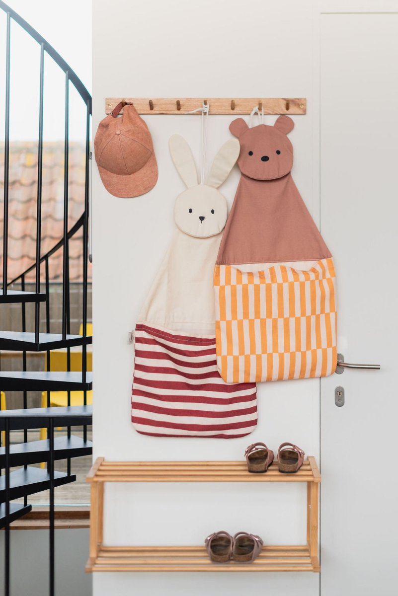 wandopberger met opbergzak voor de kinderkamer